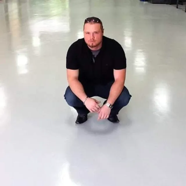 Epoxy Floors Houston owner on a finished floor